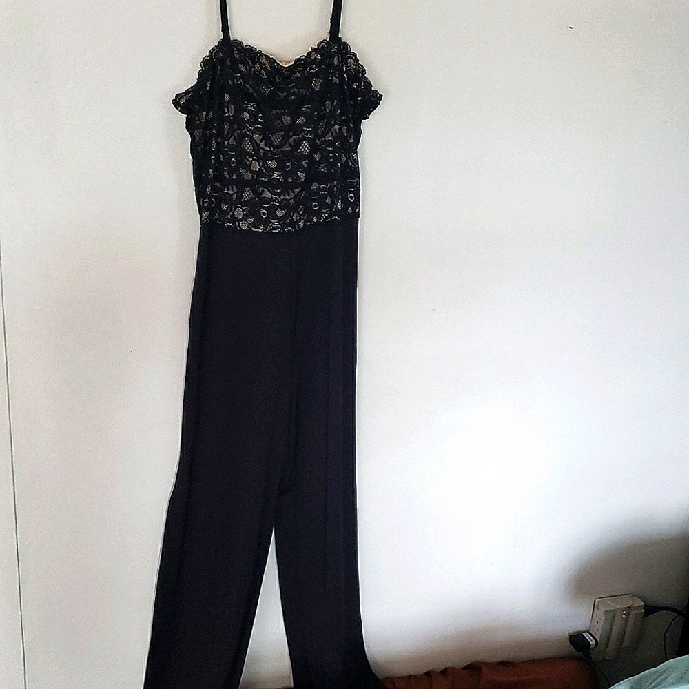 Black Jumpsuit lace top w/side leg slits. elegant. Fashionable onTrend size M